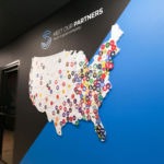 wall wrap with map of our clients